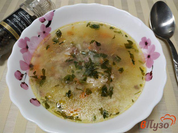фото рецепта: Рисовый суп со свиной тушенкой