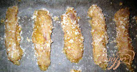 Фото приготовление рецепта: Куриные наггетсы по-домашнему шаг №6