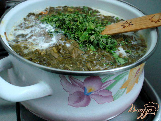 Фото приготовление рецепта: Щавелевый суп с рисом шаг №4