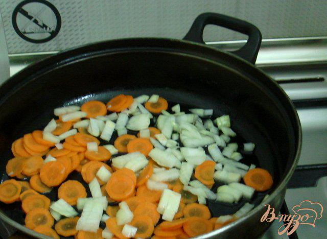 Фото приготовление рецепта: Щавелевый суп с рисом шаг №2