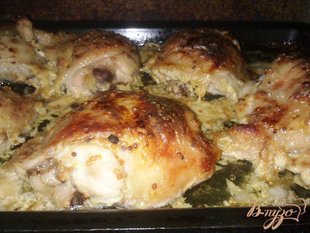 Фото приготовление рецепта: Куриные бедрышки в соусе шаг №10