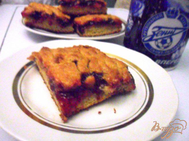 Фото приготовление рецепта: Тёртый пирог с вареньем шаг №6