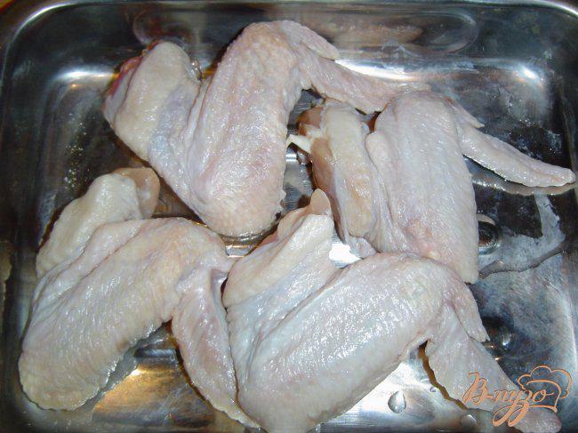 Фото приготовление рецепта: Куриные крылышки под апельсином шаг №1