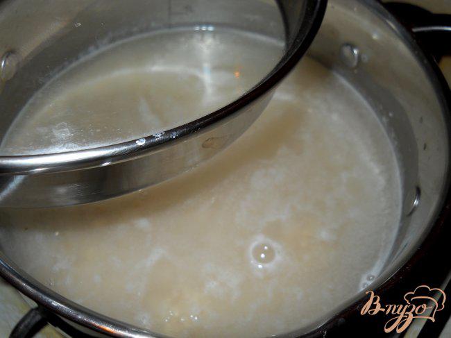 Фото приготовление рецепта: Ячневая каша томленая с маслом шаг №2