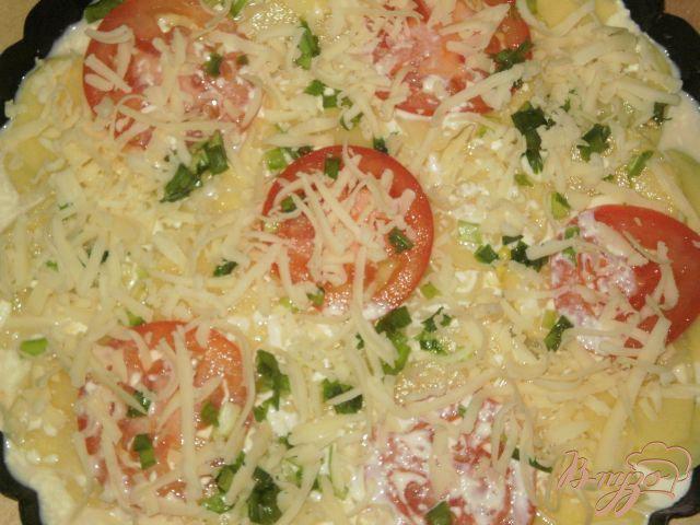 Фото приготовление рецепта: Картофель запеченный в духовке с помидорами шаг №7