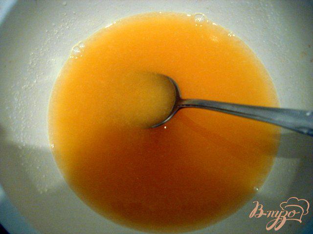 Фото приготовление рецепта: Десерт в апельсинах шаг №3