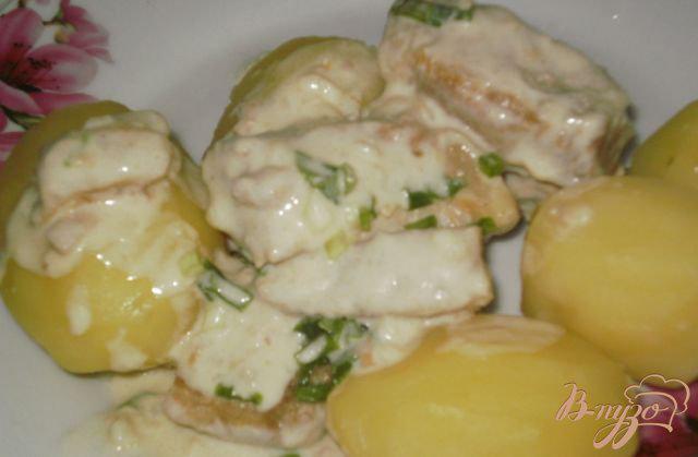 Фото приготовление рецепта: Свинина тушеная в сметанном соусе шаг №5