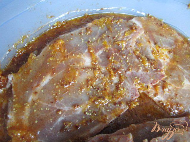 Фото приготовление рецепта: Свиной антрекот в апельсиновом маринаде шаг №2