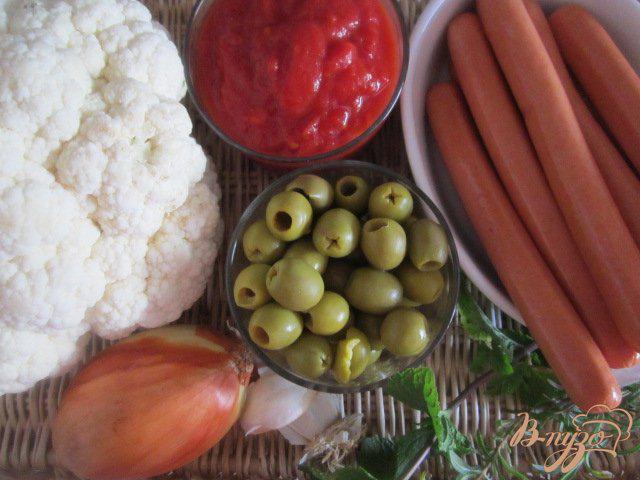 Фото приготовление рецепта: Цветная капуста с оливками шаг №1