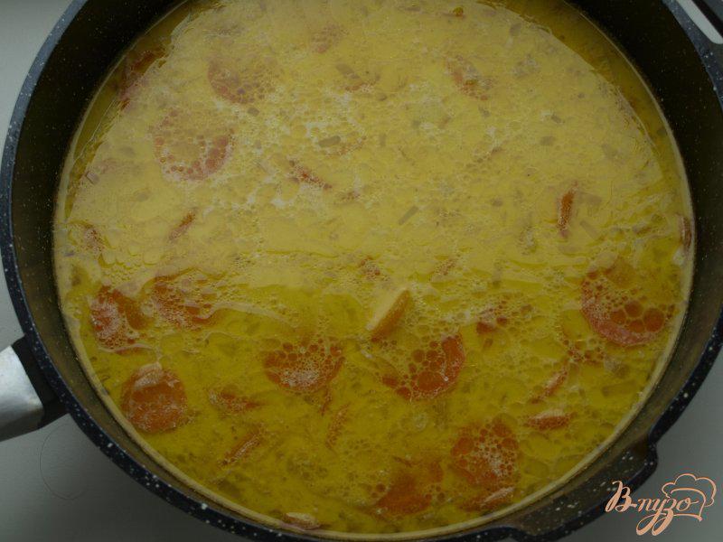 Фото приготовление рецепта: Морковно-ананасовый суп-пюре с карри шаг №5