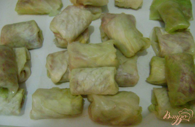 Фото приготовление рецепта: Голубцы на овощной подушке шаг №10