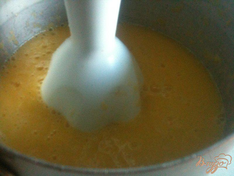 Фото приготовление рецепта: Сливочно-апельсиновая панна котта шаг №4