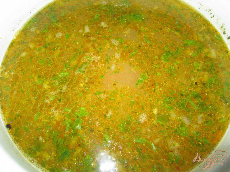Фото приготовление рецепта: Рыбный суп из сардин шаг №7