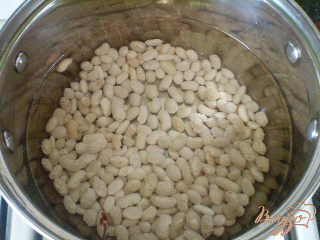 Фото приготовление рецепта: Рис сечка в томате с фасолью шаг №2