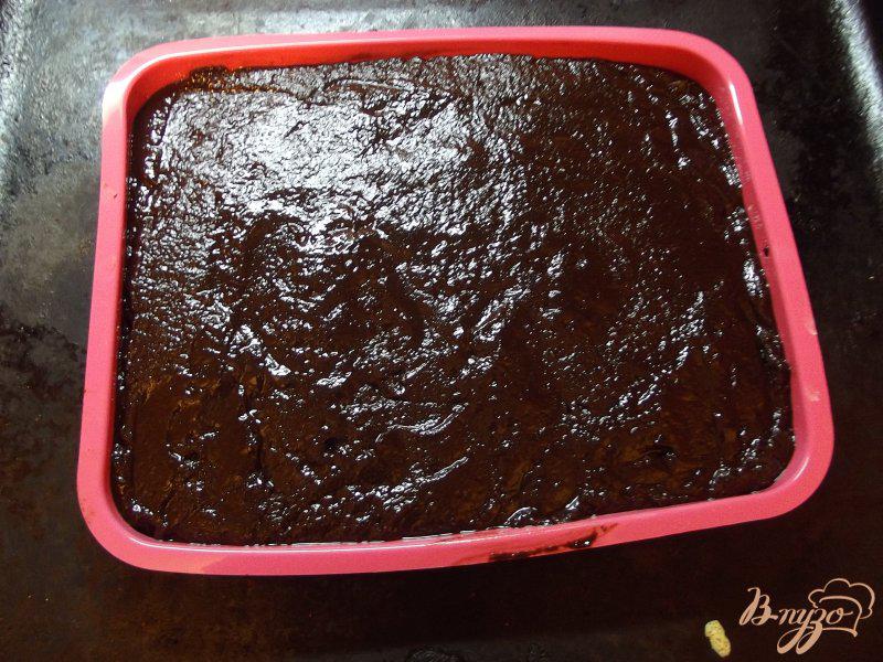 Фото приготовление рецепта: Шоколадные брауни с изюмом шаг №11