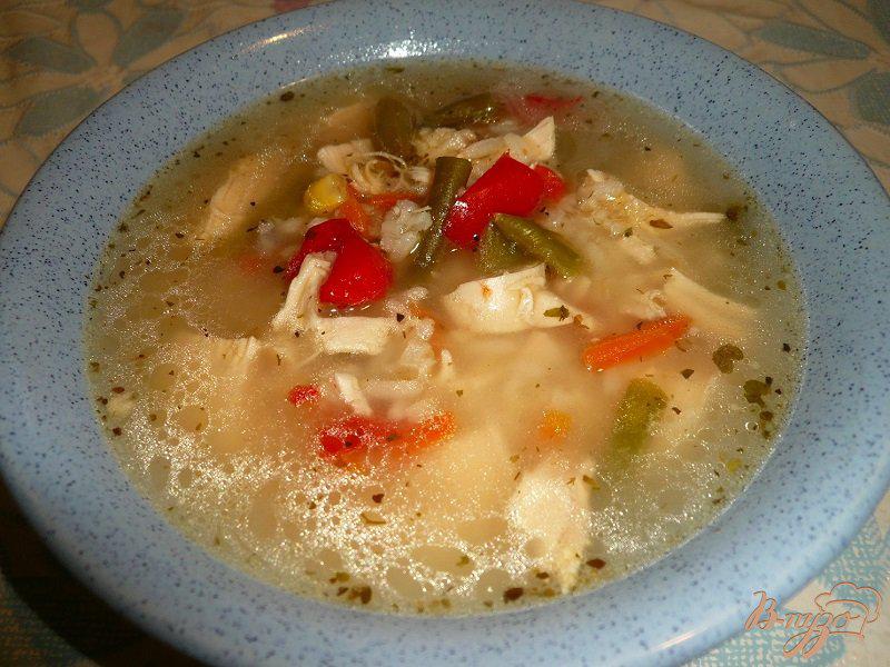 Фото приготовление рецепта: Рисовый суп с куриной грудкой и овощами шаг №5