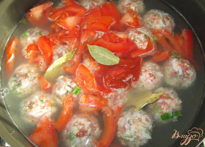Фото приготовление рецепта: Ежики со свежей зеленью в томатном соусе шаг №7