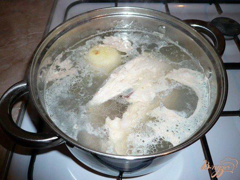 Фото приготовление рецепта: Суп с капустой и рисом шаг №2