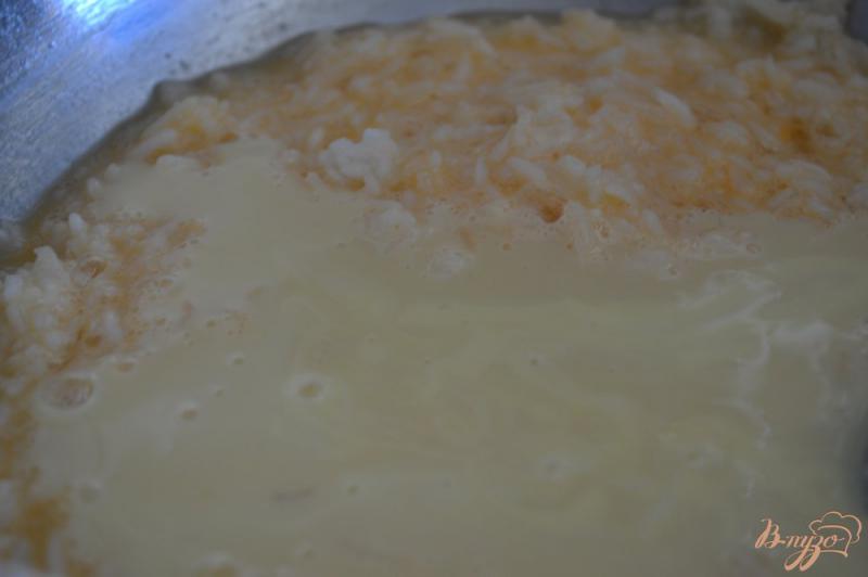Фото приготовление рецепта: Рисовый пудинг с абрикосами шаг №2