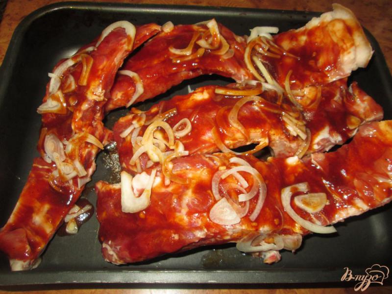 Фото приготовление рецепта: Свиные ребра запеченные в духовке шаг №6