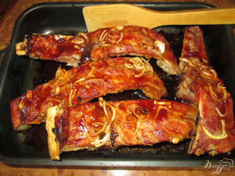 Фото приготовление рецепта: Свиные ребра запеченные в духовке шаг №7