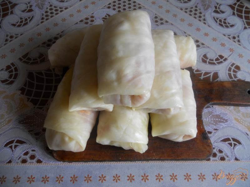 Фото приготовление рецепта: Голубцы в томатно-сметанном соусе шаг №10
