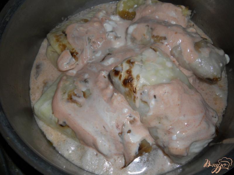 Фото приготовление рецепта: Голубцы в томатно-сметанном соусе шаг №14