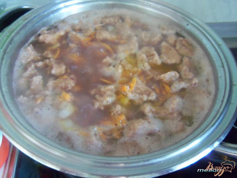 Фото приготовление рецепта: Фасолевый суп с клецками из цельнозерновой муки шаг №5