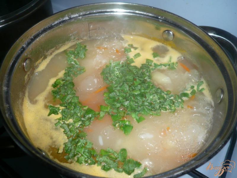 Фото приготовление рецепта: Суп с рисом и картофелем шаг №5