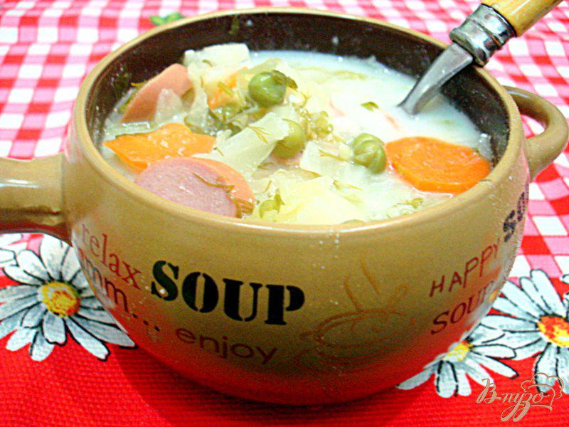 Фото приготовление рецепта: Суп с сырками и зелёным горошком шаг №10