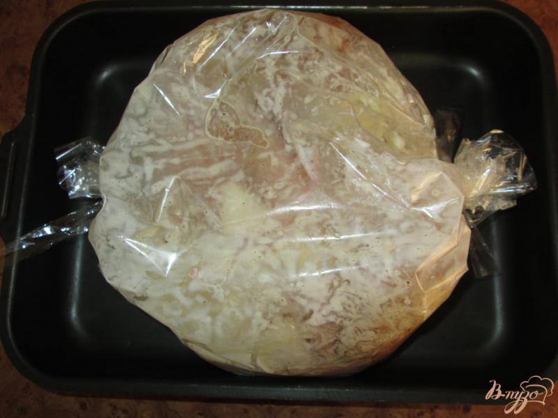 Фото приготовление рецепта: Нежная курица с картошкой в кулинарном рукаве шаг №7