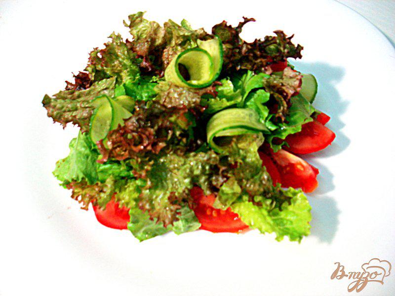 Фото приготовление рецепта: Кальмары фаршированные с салатом шаг №8