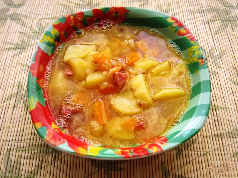 Фото приготовление рецепта: Гороховый суп с копченой колбасой шаг №9