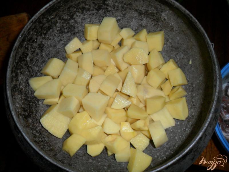 Фото приготовление рецепта: Тушенная картофель с свиными ребрами шаг №2
