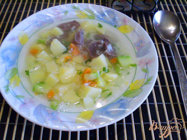 Фото приготовление рецепта: Рисовый суп с кабачком на пупках шаг №6