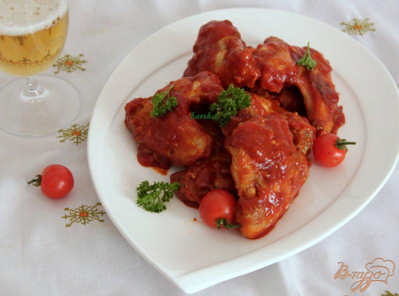 Фото приготовление рецепта: Куриные крылышки, запеченные,  в соусе «Баффало» шаг №8