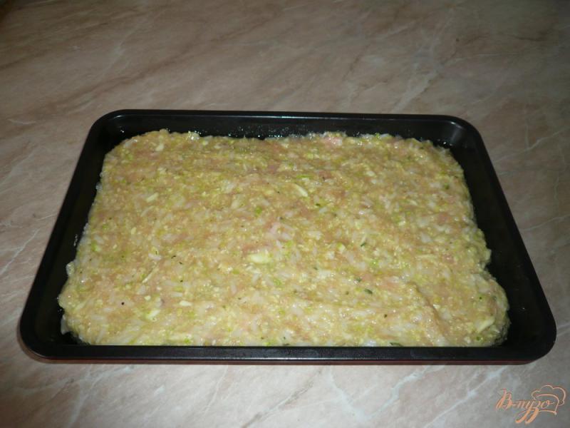 Фото приготовление рецепта: Куриная запеканка с рисом и кабачками шаг №9