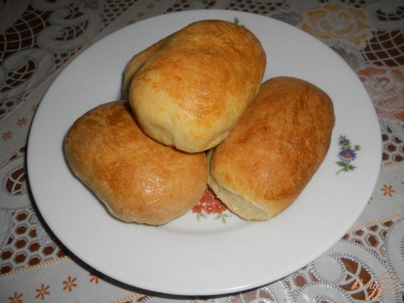 Фото приготовление рецепта: Пирожки с начинкой из квашеной капусты шаг №17