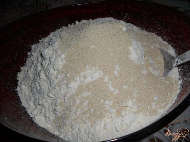 Фото приготовление рецепта: Пирожки с начинкой из квашеной капусты шаг №2
