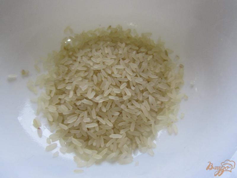 Фото приготовление рецепта: Рыбный суп с рисом шаг №5