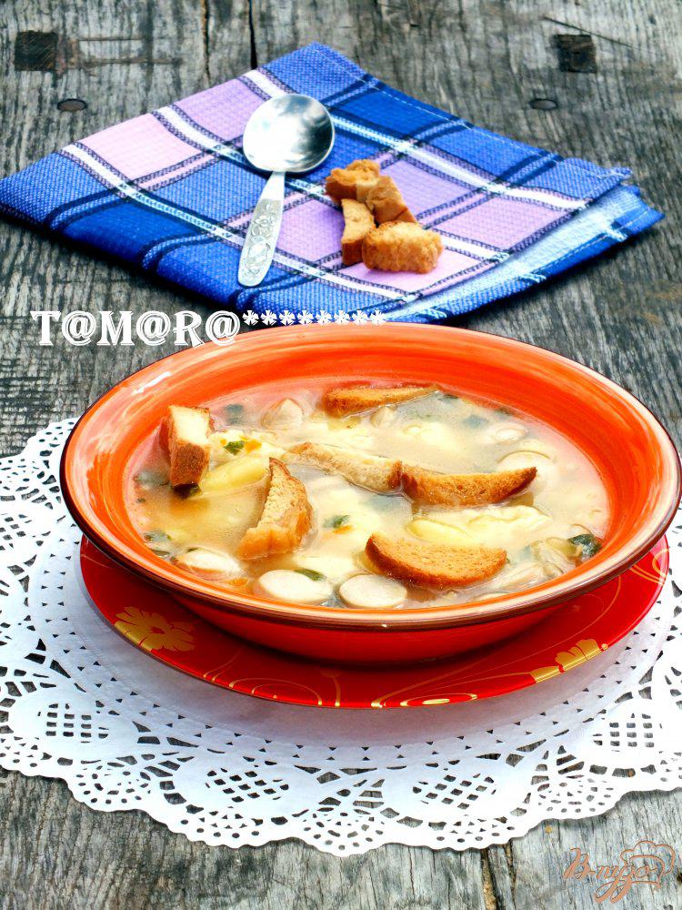 Фото приготовление рецепта: Суп с сосисками и сырными клецками шаг №8