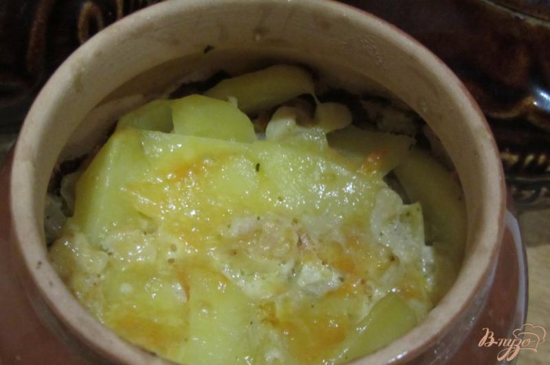 Фото приготовление рецепта: Картофель запечный в горшочках с шафраном. шаг №7