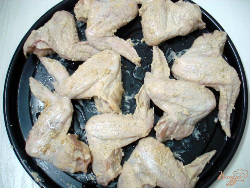 Фото приготовление рецепта: Куриные крылышки запеченные шаг №3