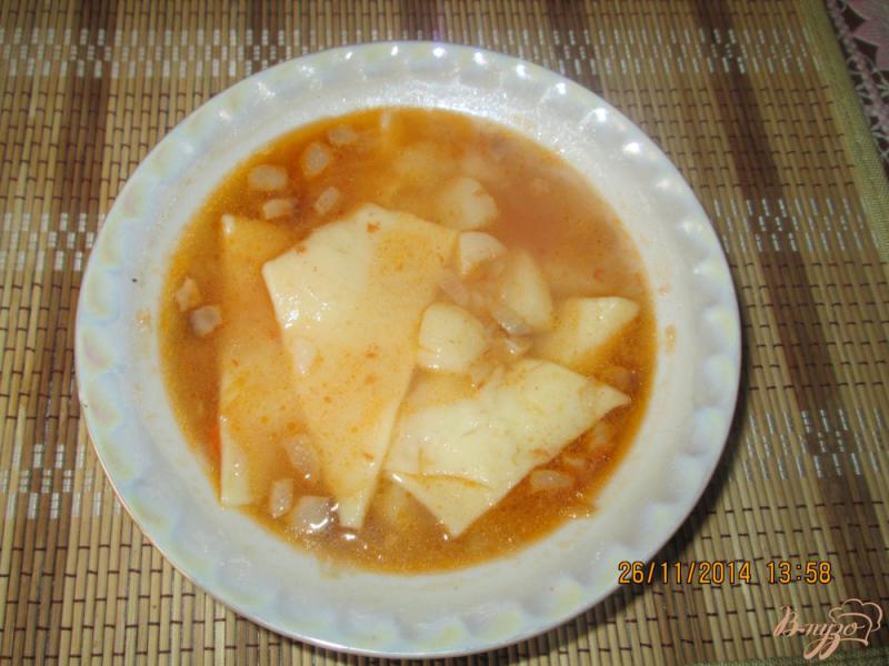 Фото приготовление рецепта: Суп с галушками без мяса шаг №6
