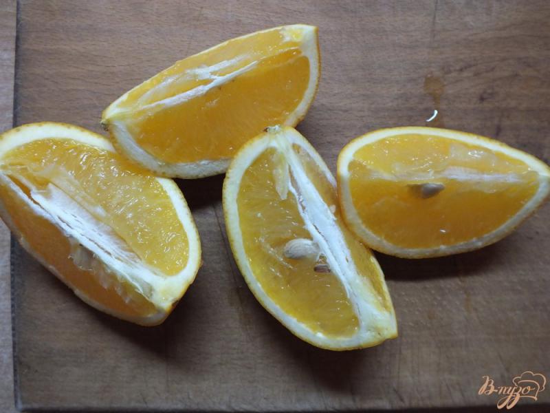Фото приготовление рецепта: Десерт из апельсина запеченного в роме с розмарином шаг №1