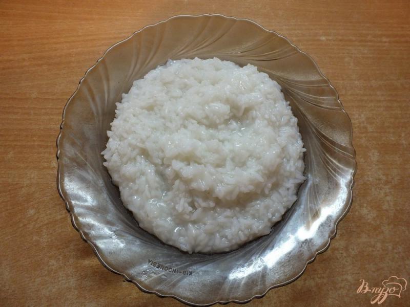 Фото приготовление рецепта: Сладким рис с вяленой ягодой к завтраку шаг №2