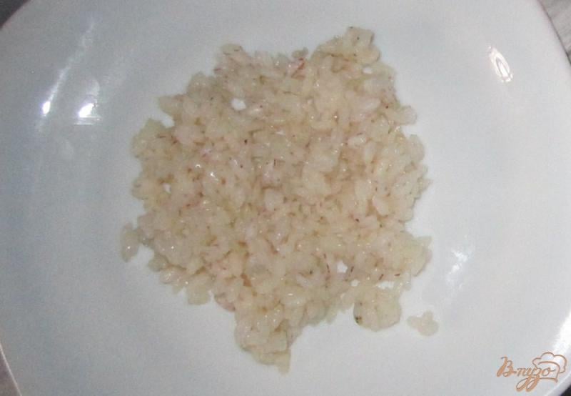 Фото приготовление рецепта: Кальмар фаршированный рисом и овощами шаг №2