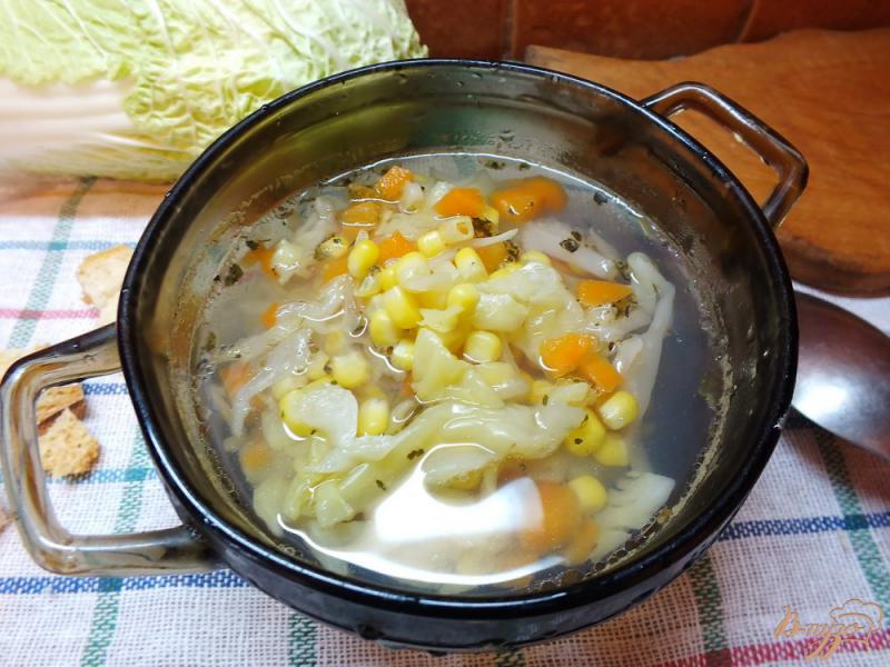 Фото приготовление рецепта: Суп из кукурузы с капустой и морковью шаг №5