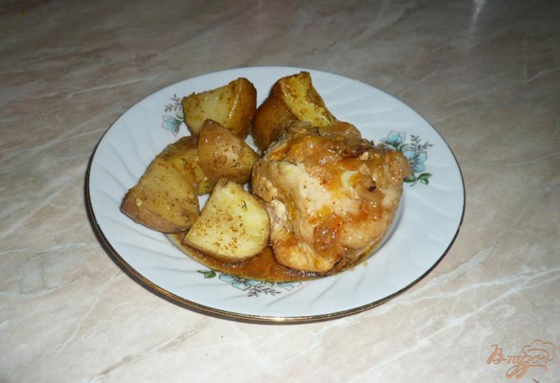 Фото приготовление рецепта: Курица в луково-апельсиновом соусе шаг №9