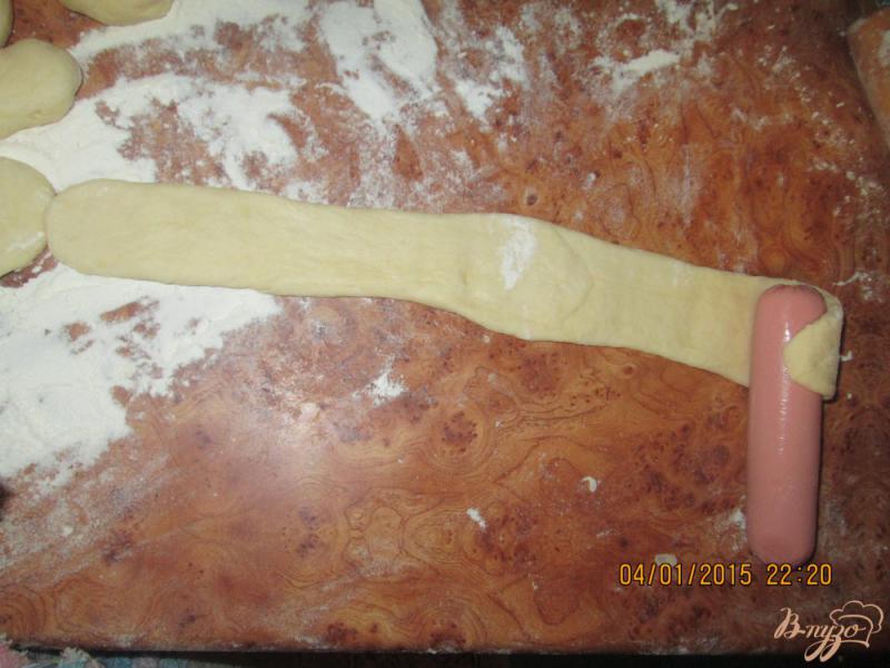 Фото приготовление рецепта: Сосиска в тесте шаг №6
